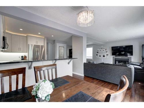 70 Riverwood Crescent Se, Calgary, AB - Indoor With Fireplace