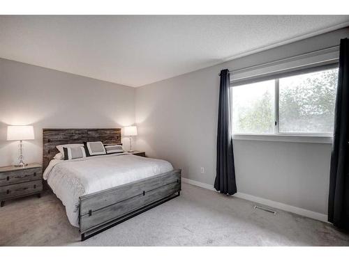 70 Riverwood Crescent Se, Calgary, AB - Indoor Photo Showing Bedroom