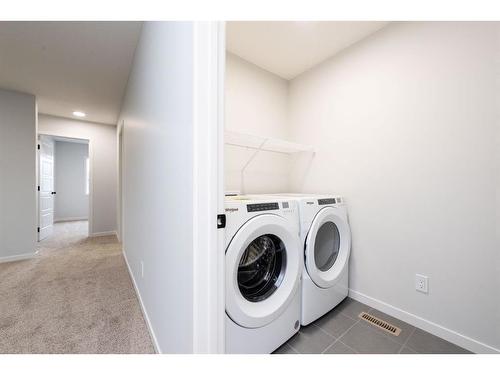 229 Chelsea Place, Chestermere, AB - Indoor Photo Showing Laundry Room
