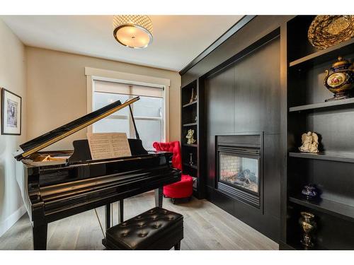 38 Aspen Dale Court Sw, Calgary, AB - Indoor With Fireplace