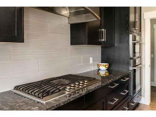 38 Aspen Dale Court Sw, Calgary, AB - Indoor Photo Showing Kitchen With Upgraded Kitchen