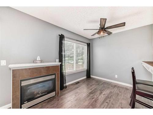 212 Stonemere Place, Chestermere, AB - Indoor With Fireplace