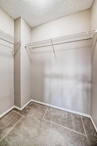 212 Stonemere Place, Chestermere, AB - Indoor With Storage