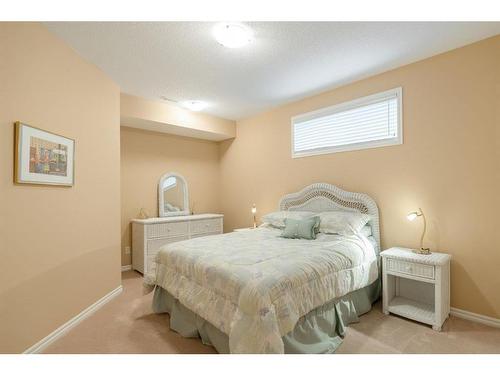 39 West Jensen Place Sw, Calgary, AB - Indoor Photo Showing Bedroom