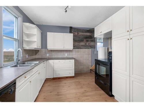 221066 Highway 56, Rural Wheatland County, AB - Indoor Photo Showing Kitchen With Double Sink
