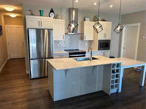 215-40 Walgrove Se, Calgary, AB - Indoor Photo Showing Kitchen With Stainless Steel Kitchen With Upgraded Kitchen