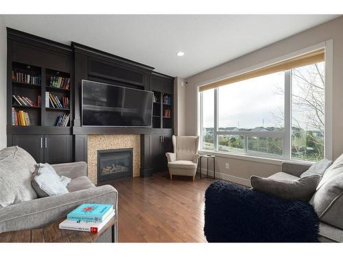103 Kincora Heath Nw, Calgary, AB - Indoor Photo Showing Living Room With Fireplace