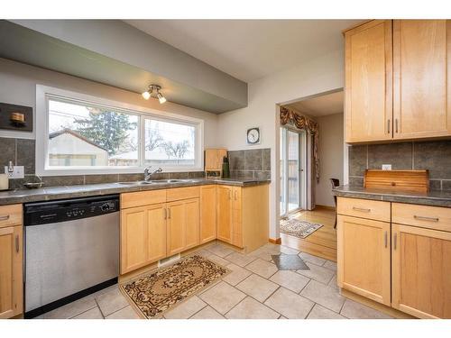 5920 Thornton Road Nw, Calgary, AB - Indoor Photo Showing Kitchen With Double Sink