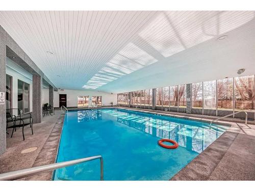 1413-4944 Dalton Drive Nw, Calgary, AB - Indoor Photo Showing Other Room With In Ground Pool