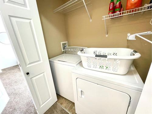 601 Prairie Sound Circle Nw, High River, AB - Indoor Photo Showing Laundry Room