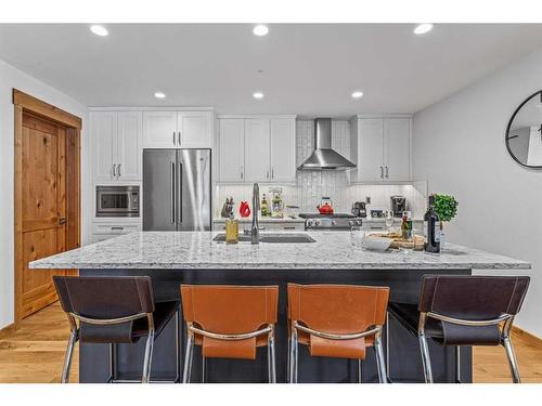 103-1105 Spring Creek Drive, Canmore, AB - Indoor Photo Showing Kitchen With Stainless Steel Kitchen With Upgraded Kitchen