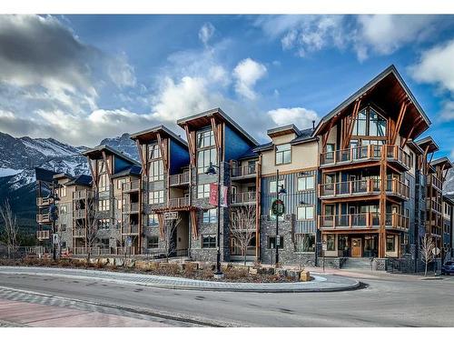 103-1105 Spring Creek Drive, Canmore, AB - Outdoor With Facade