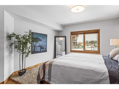 103-1105 Spring Creek Drive, Canmore, AB - Indoor Photo Showing Bedroom