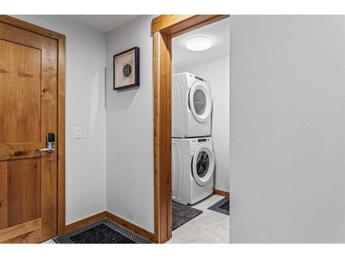 103-1105 Spring Creek Drive, Canmore, AB - Indoor Photo Showing Laundry Room