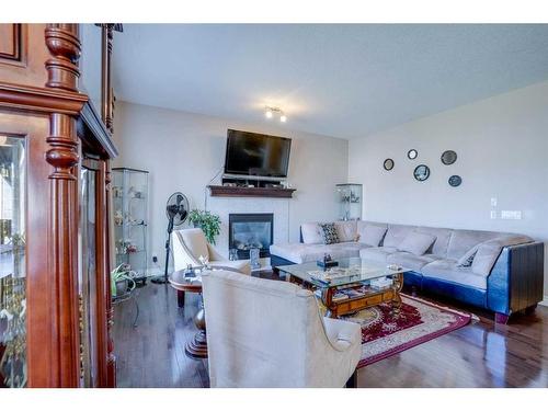 405 Taralake Landing Ne, Calgary, AB - Indoor Photo Showing Living Room With Fireplace