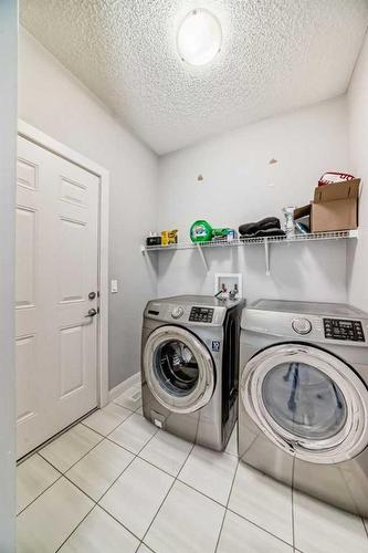136 Ravenskirk Close Se, Airdrie, AB - Indoor Photo Showing Laundry Room
