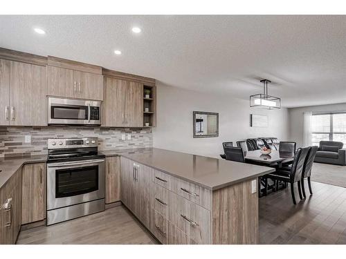 318 Legacy Village Way Se, Calgary, AB - Indoor Photo Showing Kitchen With Stainless Steel Kitchen With Upgraded Kitchen