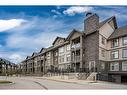 210-25 Aspenmont Heights Sw, Calgary, AB  - Outdoor With Facade 