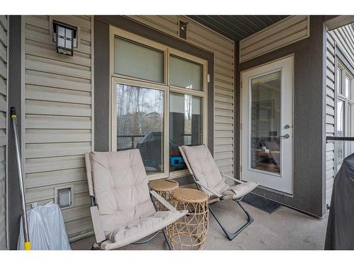 210-25 Aspenmont Heights Sw, Calgary, AB - Outdoor With Deck Patio Veranda With Exterior