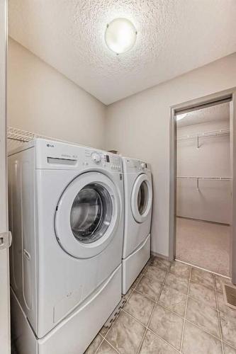 151 Everbrook Drive Sw, Calgary, AB - Indoor Photo Showing Laundry Room