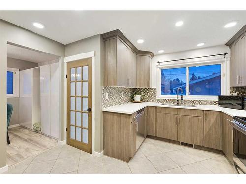 70 Hogarth Crescent Sw, Calgary, AB - Indoor Photo Showing Kitchen With Double Sink
