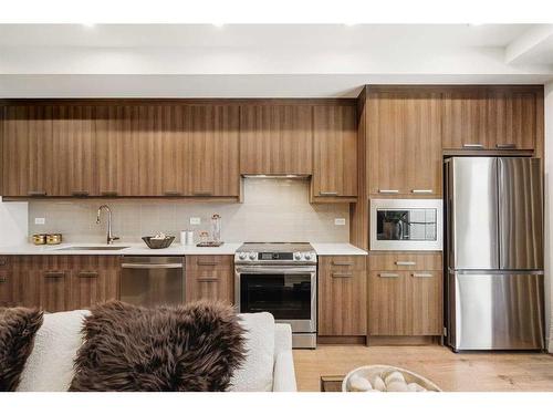 7320-1802 Mahogany Boulevard Se, Calgary, AB - Indoor Photo Showing Kitchen With Stainless Steel Kitchen