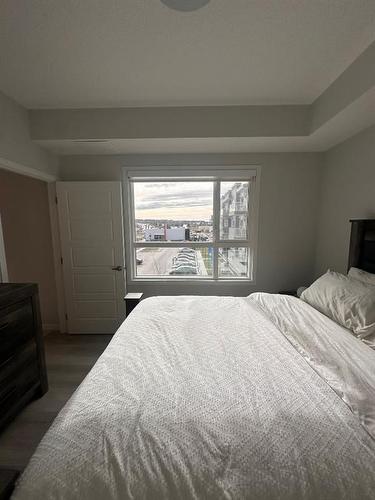 317-80 Carrington Plaza Nw, Calgary, AB - Indoor Photo Showing Bedroom