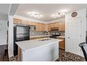 42 Evansford Grove Nw, Calgary, AB  - Indoor Photo Showing Kitchen With Double Sink 