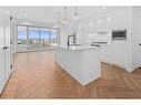 309-8445 Broadcast Avenue Sw, Calgary, AB  - Indoor Photo Showing Kitchen With Upgraded Kitchen 