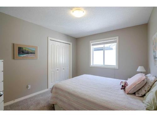2205 Vimy Way Sw, Calgary, AB - Indoor Photo Showing Bedroom