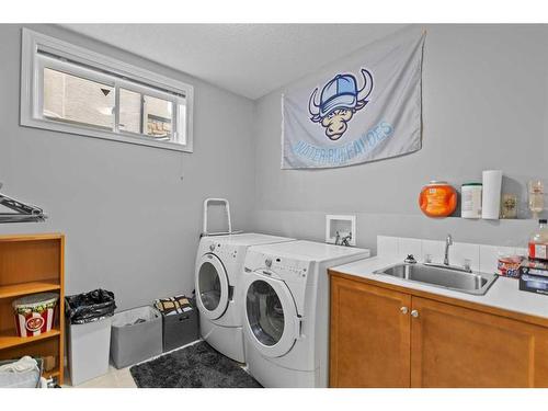 2205 Vimy Way Sw, Calgary, AB - Indoor Photo Showing Laundry Room