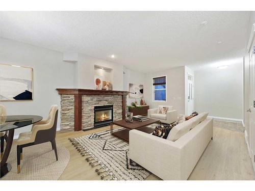 38 Discovery Heights Sw, Calgary, AB - Indoor Photo Showing Living Room With Fireplace