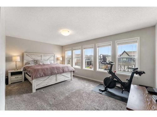 331 Reunion Green Nw, Airdrie, AB - Indoor Photo Showing Bedroom
