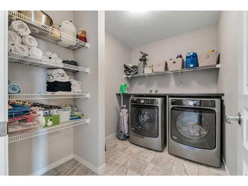 331 Reunion Green Nw, Airdrie, AB - Indoor Photo Showing Laundry Room