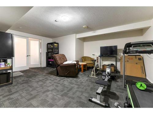 5924 Bow Crescent Nw, Calgary, AB - Indoor Photo Showing Gym Room