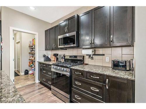 2098 High Country Rise Nw, High River, AB - Indoor Photo Showing Kitchen