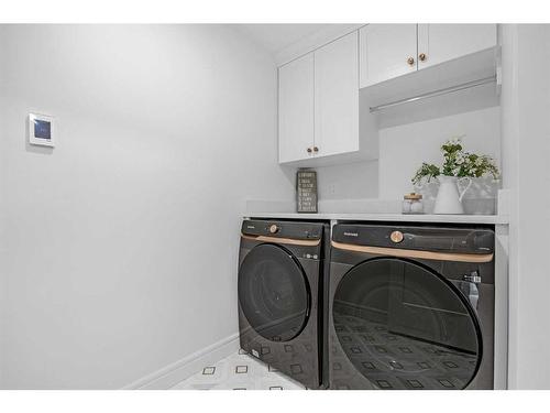 143 Canterville Road Sw, Calgary, AB - Indoor Photo Showing Laundry Room