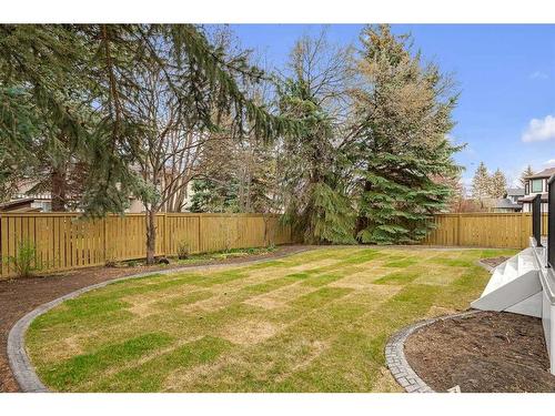 143 Canterville Road Sw, Calgary, AB - Outdoor With Backyard
