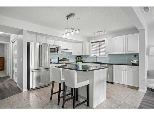 202-1608 12 Avenue Sw, Calgary, AB - Indoor Photo Showing Kitchen With Stainless Steel Kitchen With Upgraded Kitchen