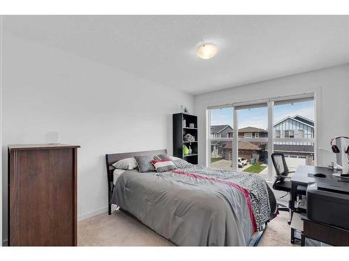 240 Carringsby Landing Nw, Calgary, AB - Indoor Photo Showing Bedroom