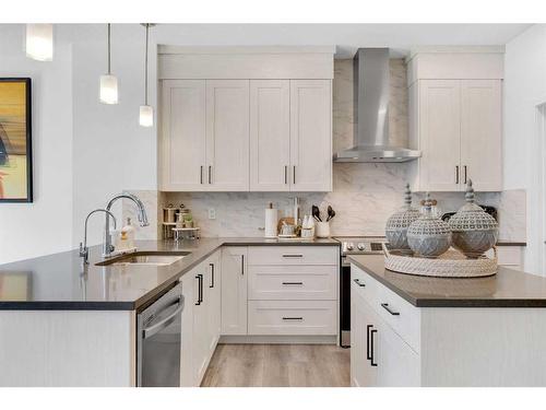 240 Carringsby Landing Nw, Calgary, AB - Indoor Photo Showing Kitchen With Upgraded Kitchen