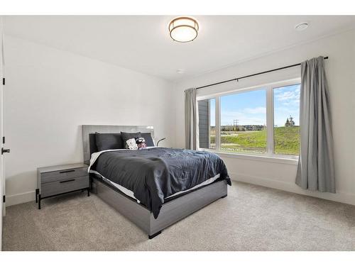 135 Clear Creek Place, Rural Rocky View County, AB - Indoor Photo Showing Bedroom