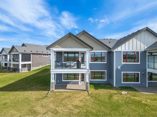 135 Clear Creek Place, Rural Rocky View County, AB - Outdoor With Facade