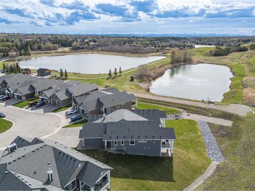135 Clear Creek Place, Rural Rocky View County, AB - Outdoor With Body Of Water With View