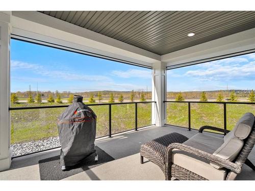 135 Clear Creek Place, Rural Rocky View County, AB - Outdoor With Deck Patio Veranda With View With Exterior