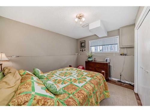 28 Mckinley Rise Se, Calgary, AB - Indoor Photo Showing Bedroom