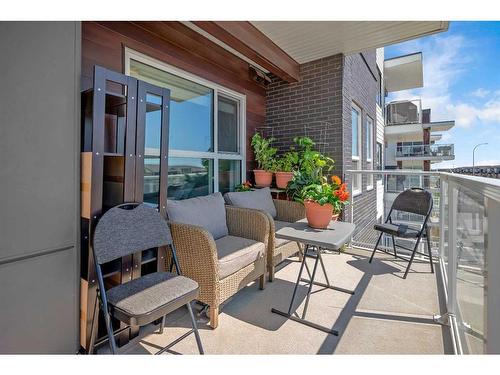 303-4150 Seton Drive Se, Calgary, AB - Outdoor With Balcony With Exterior