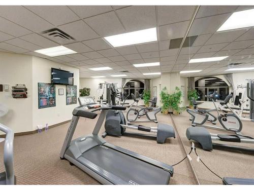 404-1726 14 Avenue Nw, Calgary, AB - Indoor Photo Showing Gym Room