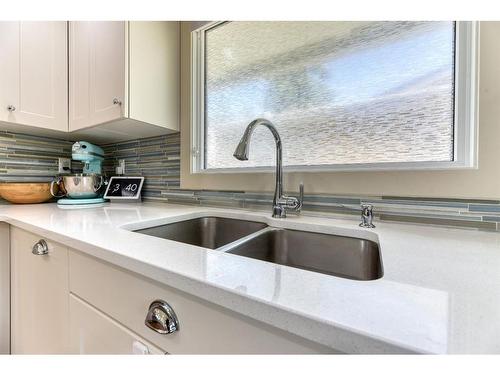 712 Lake Lucerne Drive Se, Calgary, AB - Indoor Photo Showing Kitchen With Double Sink