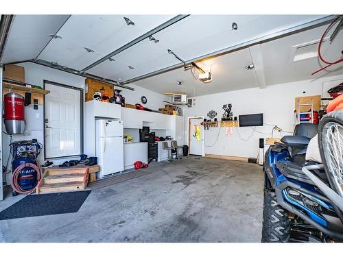 176 Kinniburgh Way, Chestermere, AB - Indoor Photo Showing Garage